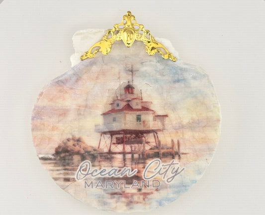 Decorative shell with a lighthouse design and 'Ocean City, Maryland' text on a white background